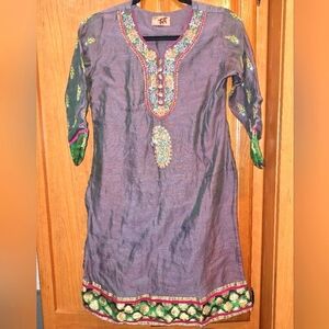 An Ornate Kala Kurti/Kafka/Kaftan with embroidery and silk accents.